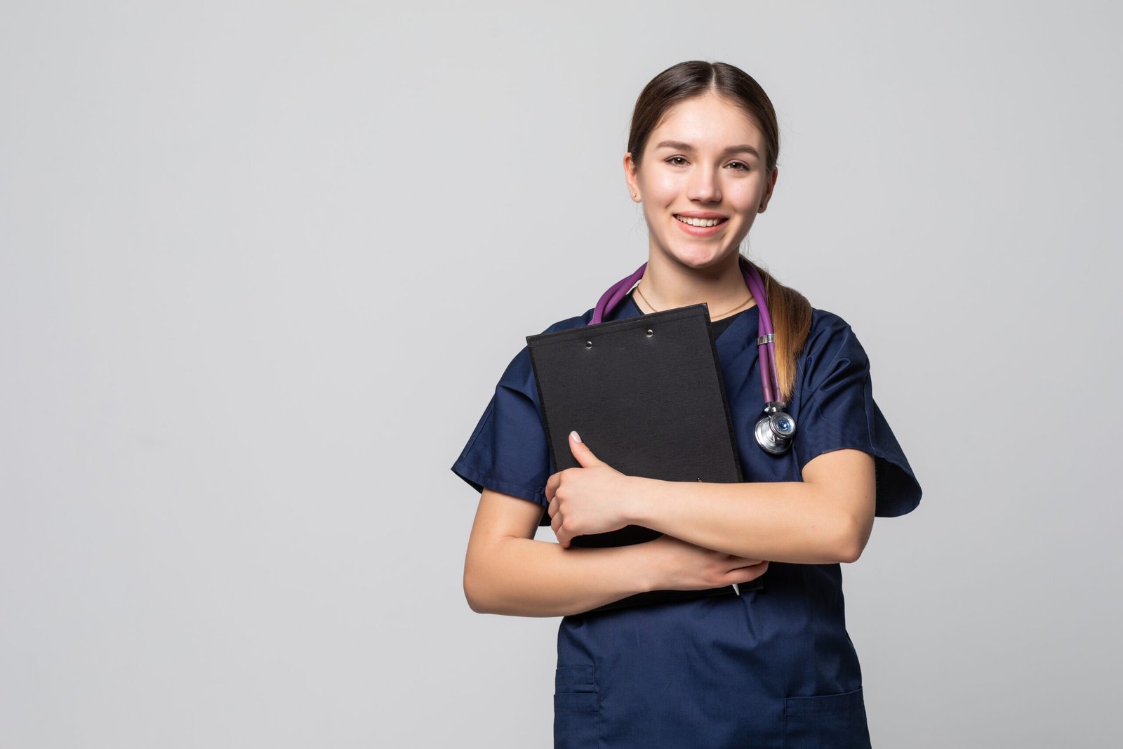 female doctor holding clipboard isolated white scaled